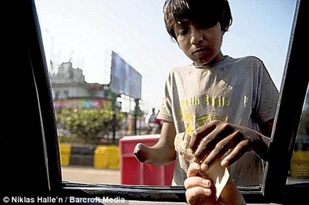A child begging on Marine Drive in south Mumbai